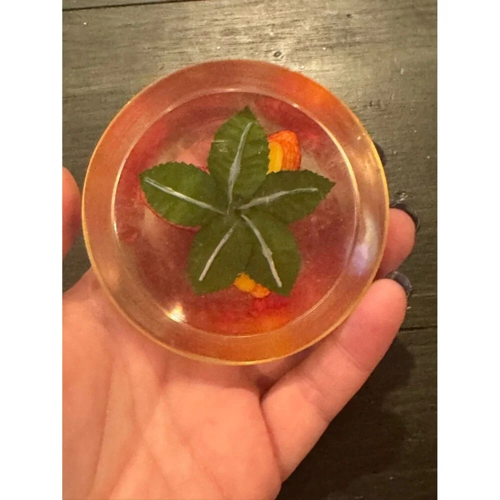 Vintage Lucite paperweight, red strawberries and green leaves